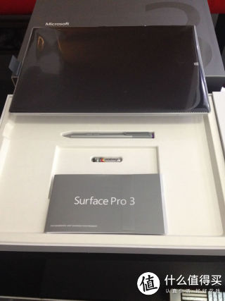surface下是质保书、说明书、笔和赠送的一节电池